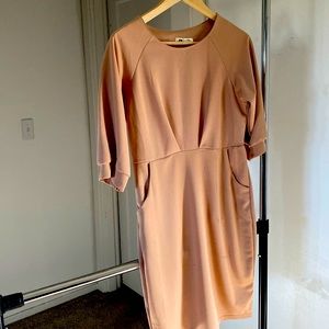 Women’s nude dress; designer “Kinky Fashion.” Never worn.